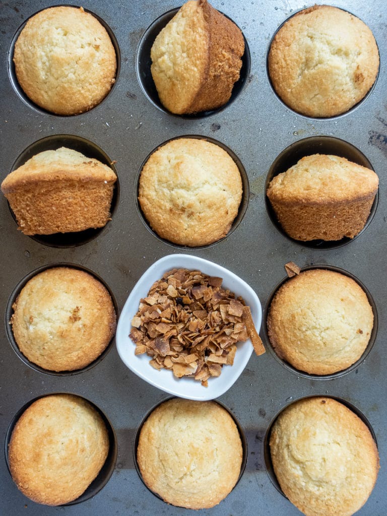 close up of coconut cupcakes in the muffin pan.