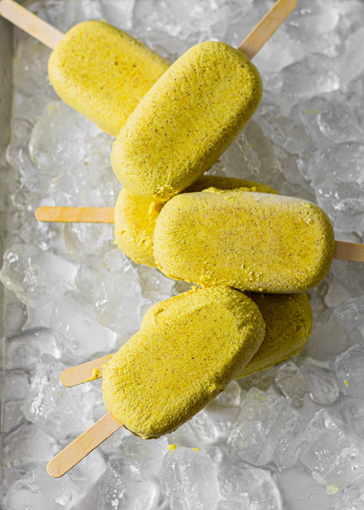 the full batch of popsicles resting on ice