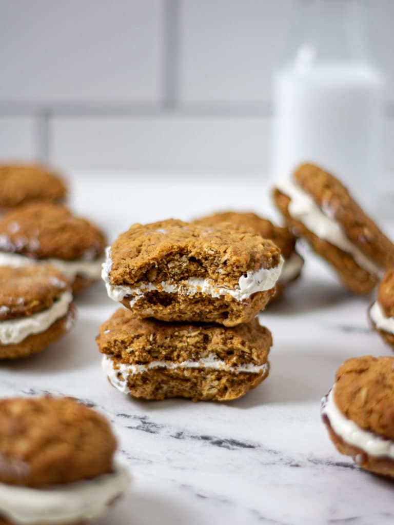 Two cookies with a big bite out of them both! 