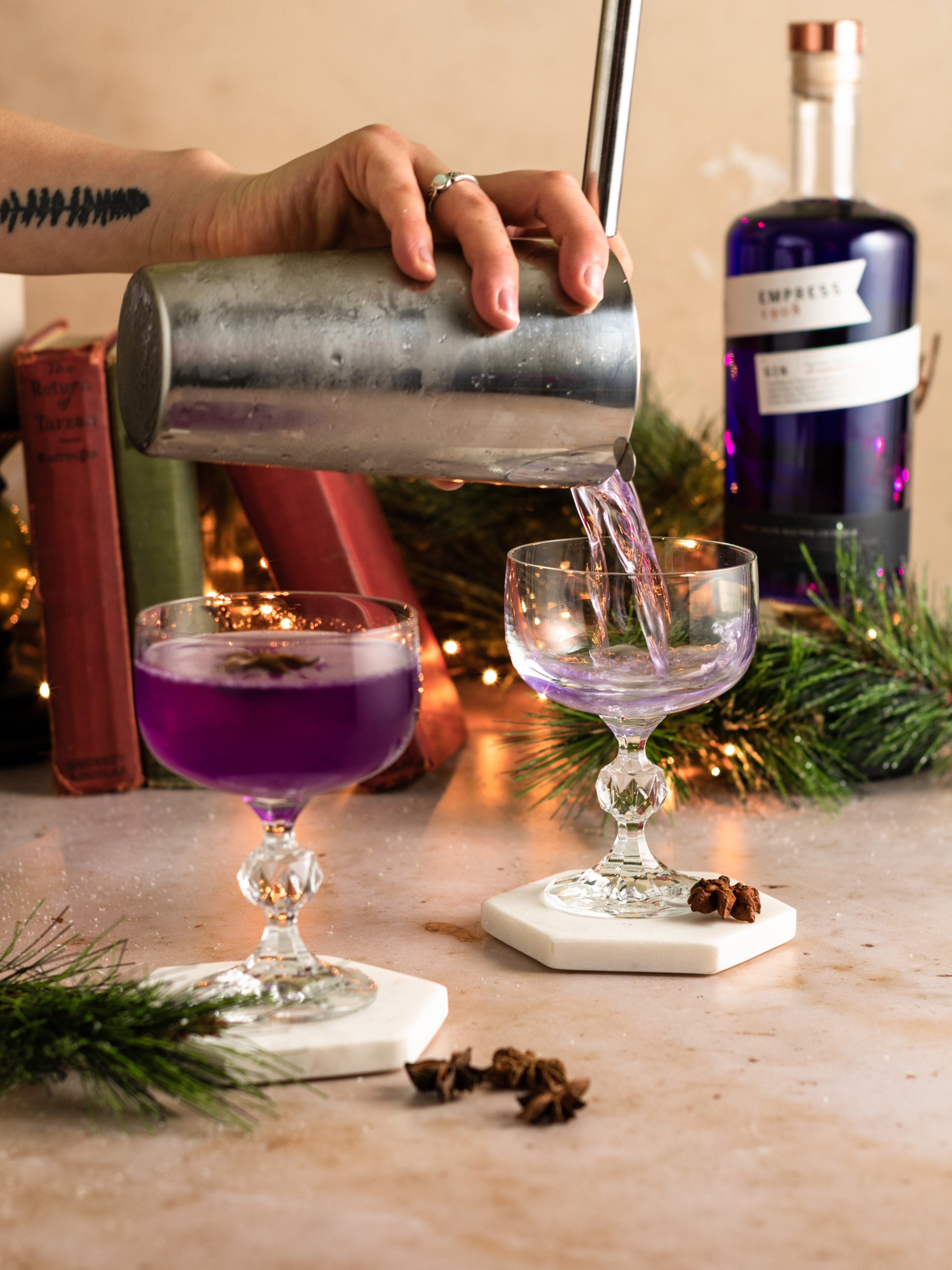 Pouring holiday gin cocktails from the shaker